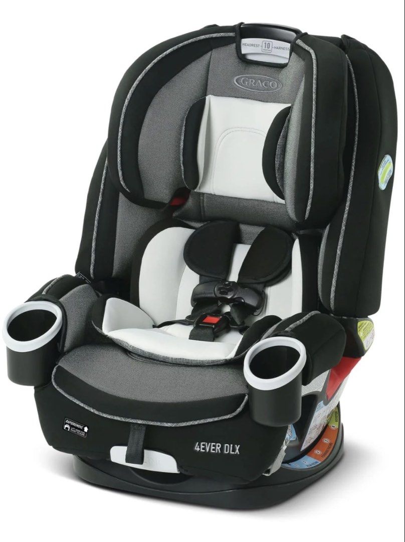 Graco 4Ever Convertible Car Seat (Category: Car Seats) located in Paranaque City. Submitted by samgomez29 (Listing ID 1425327335, Image 2). Description: Graco car seat features a black design with two cup holders. It has multiple safety labels and instructions for forward and rear-facing installation. It has a headrest and side impact protection..