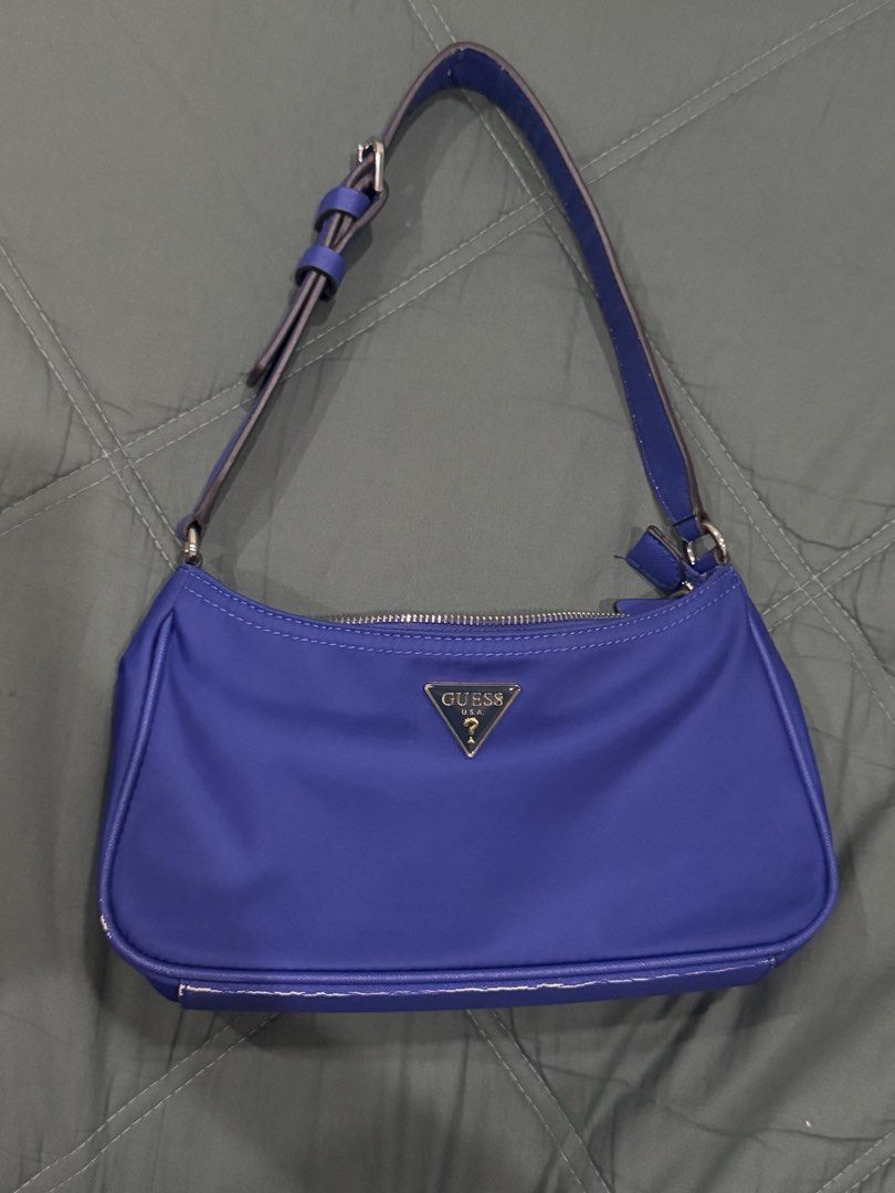 Guess Shoulder Bag (Category: Shoulder Bags) located in Cagayan de Oro. Submitted by vgiveraaa (Listing ID 1425330715, Image 1). Description: -GUESS nylon shoulder bag -bought it 3800 -selling 1990 -used 3x only -minor crease on the bottom part.