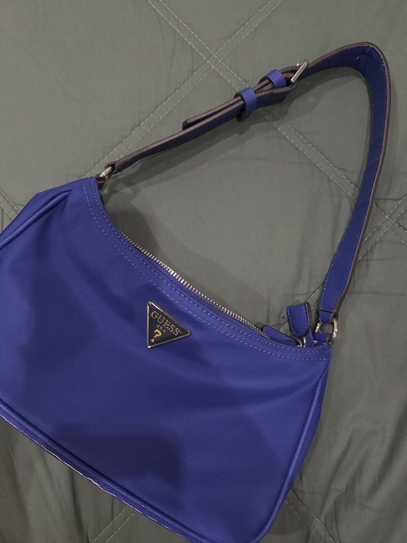 Guess Shoulder Bag (Category: Shoulder Bags) located in Cagayan de Oro. Submitted by vgiveraaa (Listing ID 1425330715, Image 2). Description: -GUESS nylon shoulder bag -bought it 3800 -selling 1990 -used 3x only -minor crease on the bottom part.