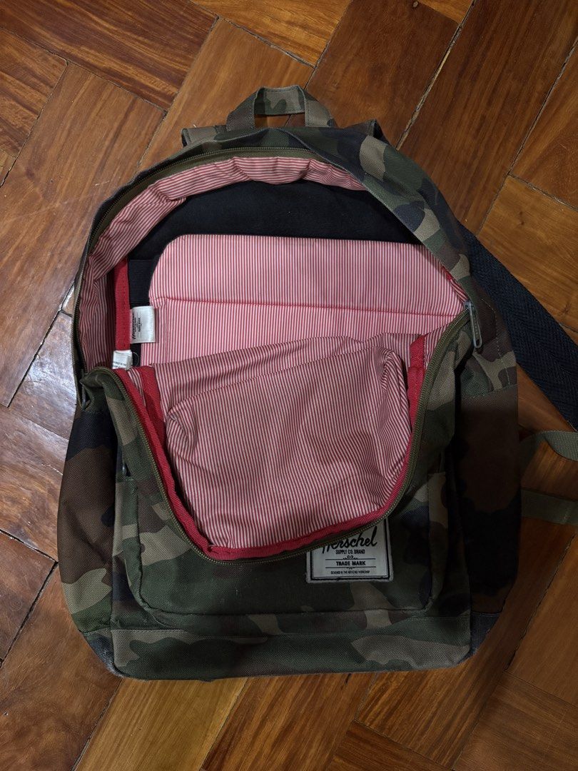 Herschel Camo Backpack (used) (Category: Backpacks) located in Quezon City. Submitted by keryaolim (Listing ID 1425407887, Image 2). Description: - Herschel Camo Backpack - Stylish camo design - Spacious main compartment - Front pocket for easy access - Signature red and white striped interior lining - Durable and functional Heavily used. Interior is still good. Exterior has obvious signs of use. All original. Price is slightly negotiable..