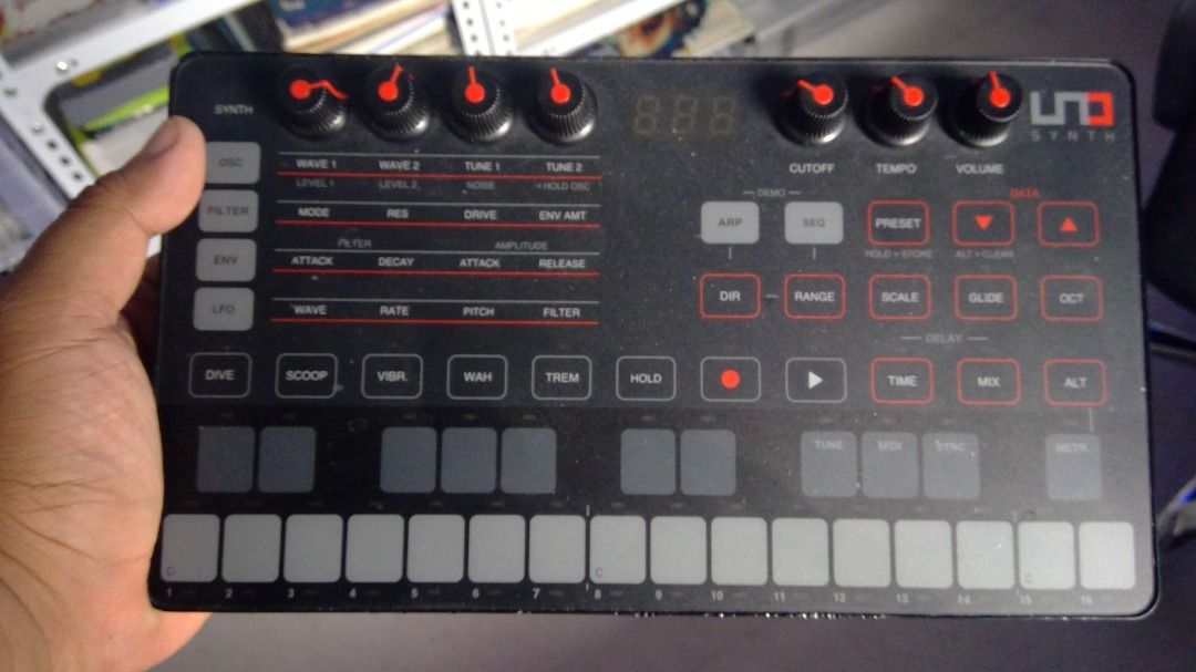 IK Multimedia UNO Synth Analog Synthesizer (Category: Musical Instruments) located in Butuan. Submitted by reggex99 (Listing ID 1425322731, Image 1). Description: IK Multimedia UNO Synth is an analog synthesizer. It features controls for synth, filter, envelope, LFO, and delay. It has a built-in arpeggiator and sequencer. The synthesizer has a USB port, and audio input and output jacks. It is powered by USB or batteries. The unit is black with re
