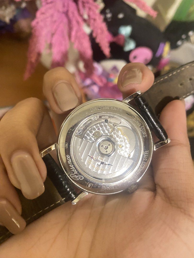 Longines Presence Automatic Watch with original belt (Category: Luxury Watches) located in Manila. Submitted by ajustinet96725 (Listing ID 1425306946, Image 3). Description: Brand: Longines Model: Présence Automatic Reference: L4.821.4.11.2 Movement: Swiss Automatic (self-winding) Case: Stainless steel Dial: Clean white dial with Roman numerals Crystal: Scratch-resistant sapphire Style: Classic dress watch Condition: Good condition (normal light 