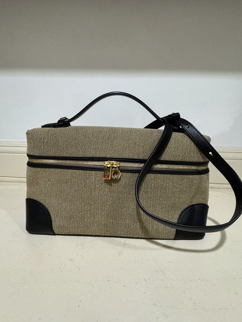Loro L27 canvas (Category: Cross-body Bags) located in Cebu City. Submitted by refabph (Listing ID 1425285703, Image 1). Description: Loro Piana Canvas L27 • Beige canvas body • Black leather trim & handle • Gold hardware with LP zipper pull • Structured vanity style • Detachable shoulder strap • Japan sourced Condition: Good pre-owned condition with minor flaw ✔ Clean interior ✔ Structure intact ✔ Hardware shiny Note: Small stain at the back (se