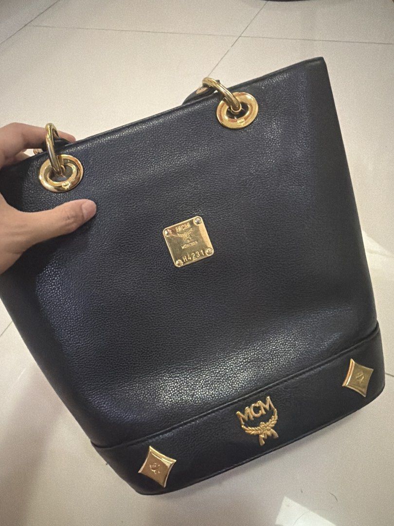MCM Vintage Black Bucket Bag (Category: Luxury Bags & Wallets) located in Cabanatuan. Submitted by justcram (Listing ID 1425312720, Image 2). Description: Vintage Bucket bag from MCM -Guaranteed Authentic -Condition is still good -Price in the market is still around Php 14-16k -Selling it for only Php 9,500 -Price is still negotiable Rfs: Di na nagagamit masyado.