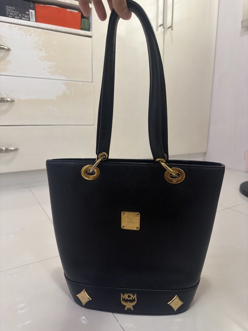 MCM Vintage Black Bucket Bag (Category: Luxury Bags & Wallets) located in Cabanatuan. Submitted by justcram (Listing ID 1425312720, Image 1). Description: Vintage Bucket bag from MCM -Guaranteed Authentic -Condition is still good -Price in the market is still around Php 14-16k -Selling it for only Php 9,500 -Price is still negotiable Rfs: Di na nagagamit masyado.