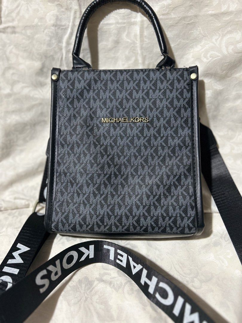 Michael Kors Handbag with Shoulder Strap (Category: Cross-body Bags) located in San Pedro. Submitted by andr39 (Listing ID 1425382985, Image 1). Description: 📍San Pedro, Laguna Michael Kors mini bag. Stored and used only once. Slight issue on the handle (3rd photo) Approximate dimensions: L: 8 inches W: 3 inches H: 9 inches ❗️MoP: BDO, Gcash ❗️ Color may vary from actual item due to lighting and phone settings.