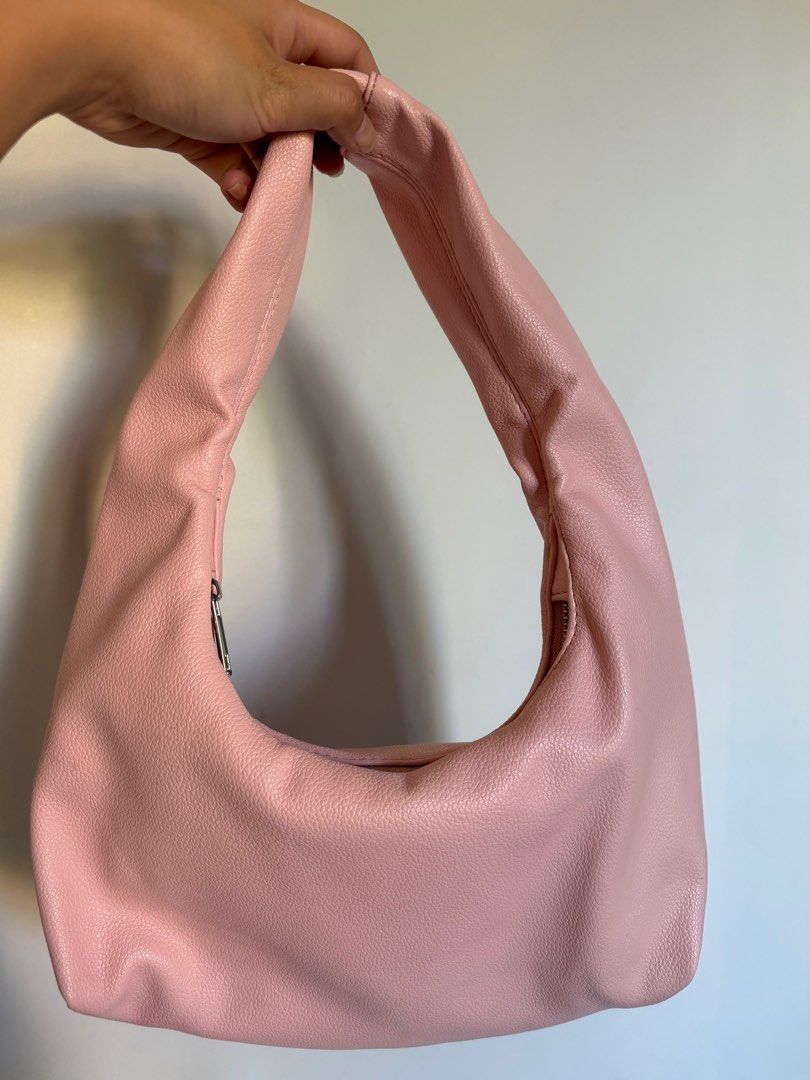 Michi Shoulder Bag in Pink Pebble Leather (Category: Shoulder Bags) located in Makati City. Submitted by patfindss (Listing ID 1425340563, Image 2). Description: Pebble Leather Size small in Pink Silver Zipper white lining With compartment inside with zipper.