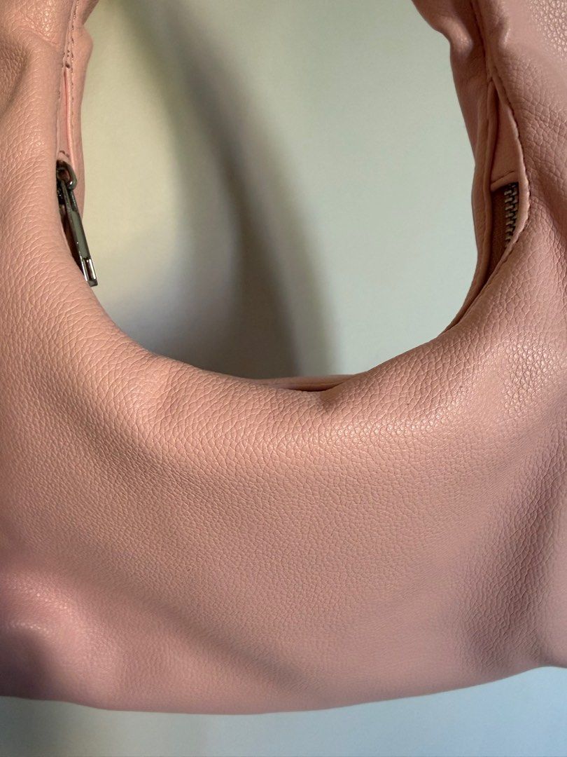 Michi Shoulder Bag in Pink Pebble Leather (Category: Shoulder Bags) located in Makati City. Submitted by patfindss (Listing ID 1425340563, Image 3). Description: Pebble Leather Size small in Pink Silver Zipper white lining With compartment inside with zipper.