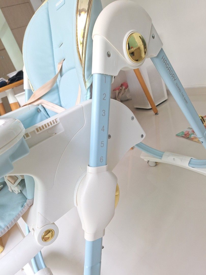 Adjustable Baby Blue High Chair Multifunctional with Wheels Hagaday Infant Toddler Foldable (Category: Baby High Chairs) located in Singapore. Submitted by bubblybunii (Listing ID 1425303500, Image 3). Description: Condition 8/10 Weight around 15kg, self collect at Eunos near mrt - Can be folded: 1 metre tall and 40cm wide - Blue seat with lockable gold wheels - Seat recline options - Chair with 7 adjustable height - Removable food tray.