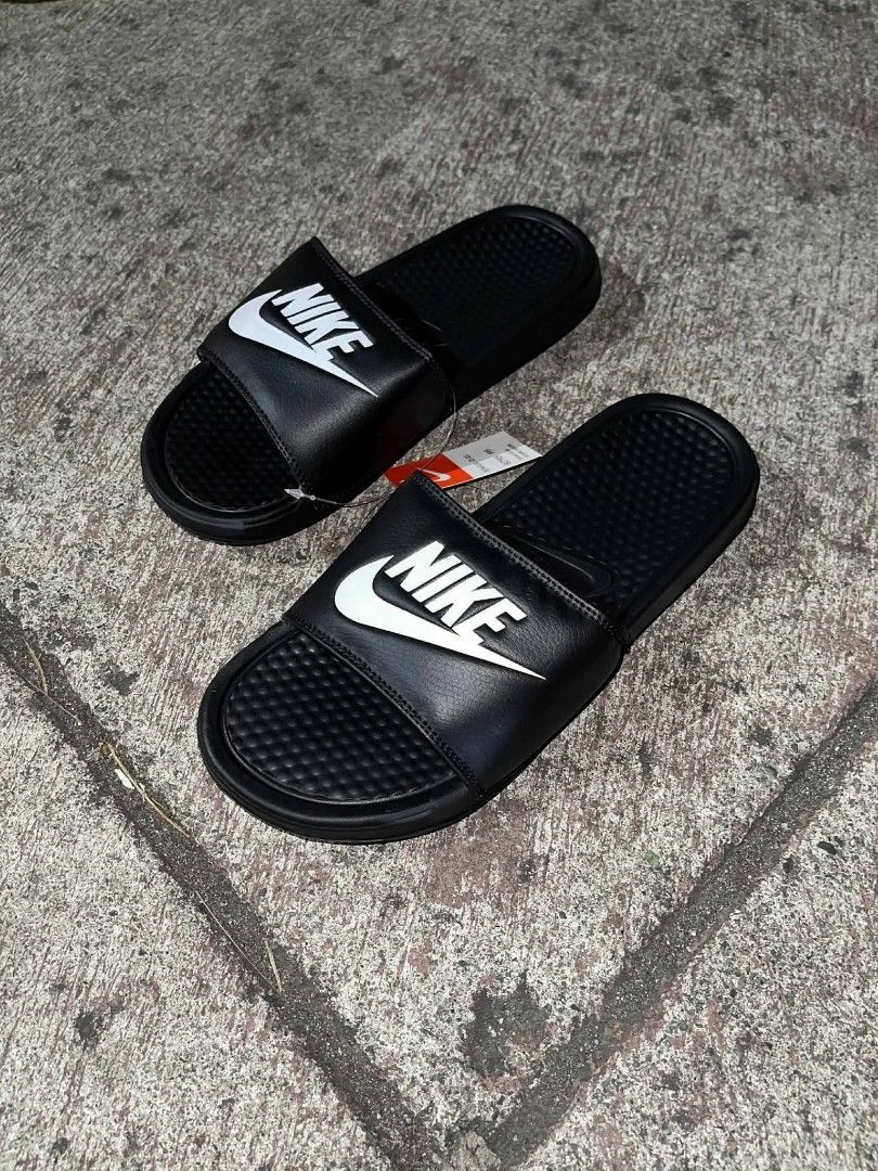 Nike Benassi Slides - Black (Category: Slippers & Slides) located in Mandaluyong City. Submitted by im7788 (Listing ID 1425260998, Image 1). Description: Available Size 7 to 9.5.