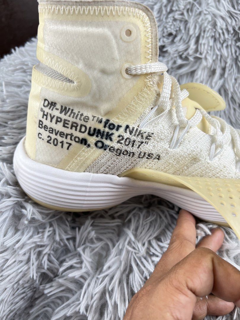 Nike Off-White Hyperdunk 2017 (Category: Sneakers) located in Cebu City. Submitted by kayekallie (Listing ID 1425382827, Image 3). Description: Off-White x Nike Hyperdunk 2017 sneakers. Features the signature Off-White design elements, including the "FOAM" text on the midsole and the orange tab. The shoes have a cream and white color scheme with a translucent midfoot panel. The size is US 8.5, UK 7.5, EUR 42, and 26.5 cm. Made in Vietnam. In very