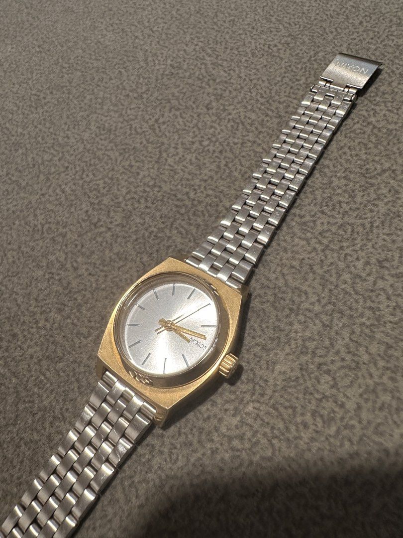 Nixon Small Time Teller Watch (Category: Women's Watches) located in Singapore. Submitted by vonamour (Listing ID 85162335, Image 2). Description: Gold and silver small time teller bracelet watch. .