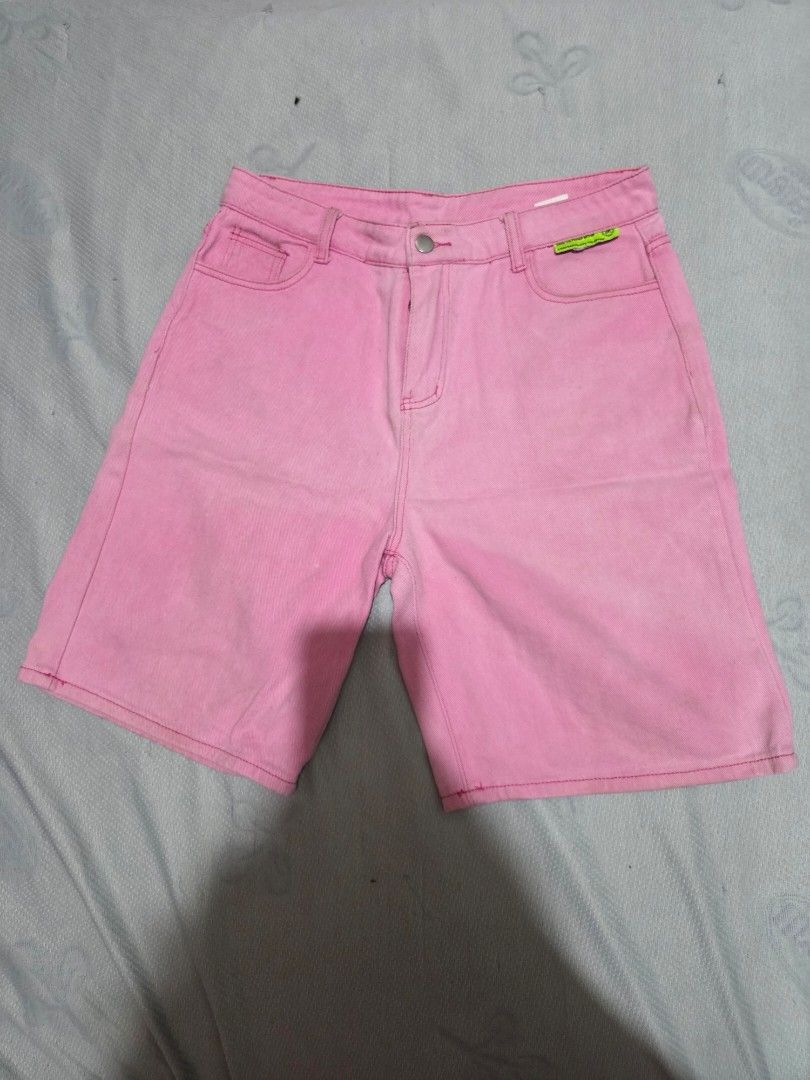 Pink Denim Shorts (Category: Shorts) located in Manila. Submitted by declutterwtly (Listing ID 1425386993, Image 1). Description: Send me your offers, TYSM! ♡ -Pink denim jorts feature a classic five-pocket design. -They have a button and zipper closure. -The shorts appear to be a standard fit, suitable for casual wear. -The shorts have a faded look..