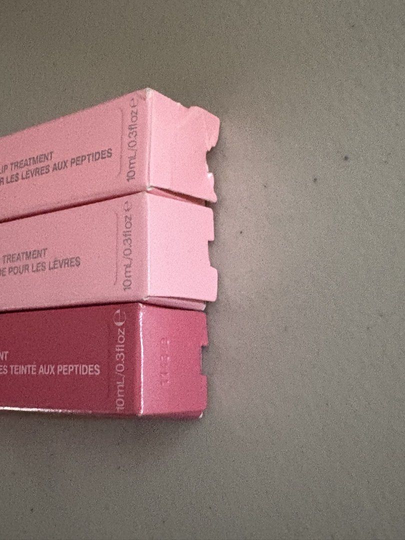 Rhode Peptide Lip Treatment ( Sugar Cookie & Vanilla) (Category: Makeup) located in Manila. Submitted by stefandraboutique (Listing ID 1425282382, Image 2). Description: 1999 php each sugar cookie & vanilla, last 3 lip peptides! only opened for photos.