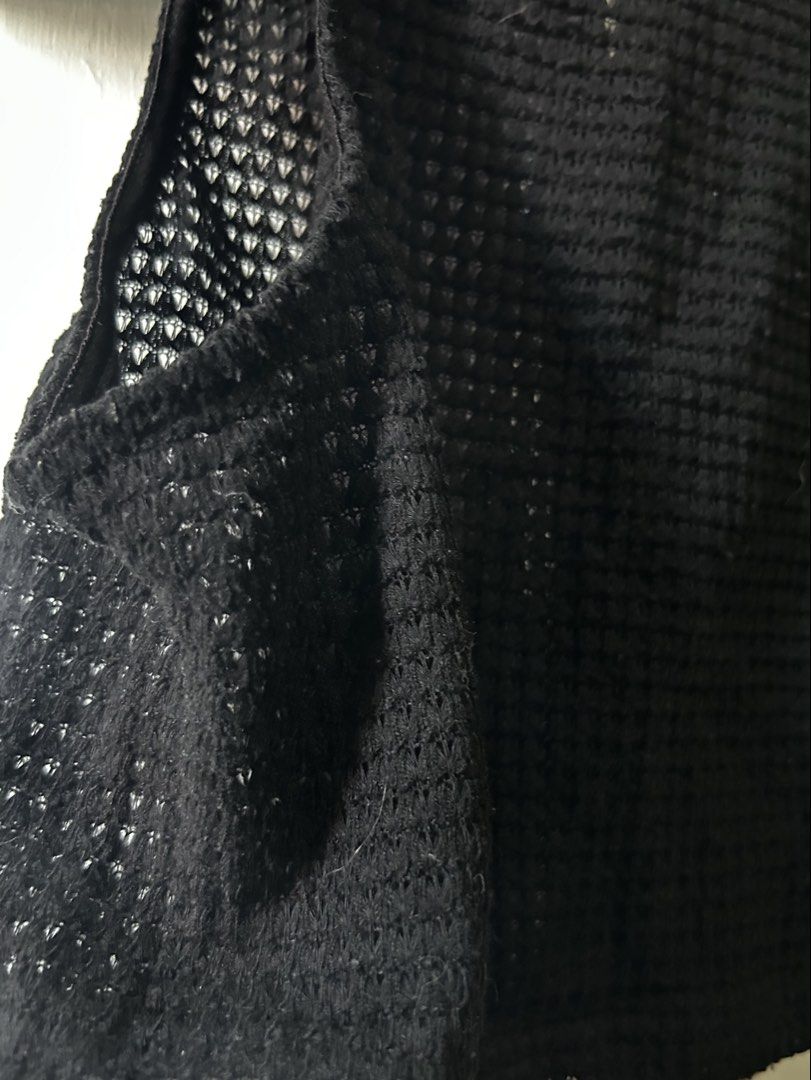 SHEIN Black Waffle Knit Crop Top [S] (Category: Others Tops) located in Caloocan City. Submitted by ctrl12 (Listing ID 1425351104, Image 3). Description: Black crop top from SHEIN. Features a textured fabric with a keyhole detail at the back. Sleeveless design with a round neckline. The tag is visible in the image. Rfs: decluttering MOP: GCash MOD: J&T/lalamove.