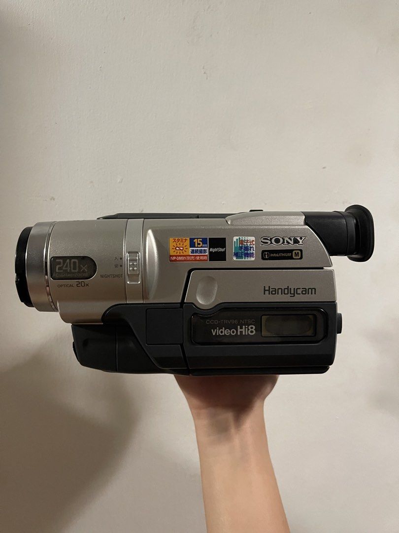 Sony Handycam VHS Hi8 Camcorder (Category: Video Cameras) located in Pasay City. Submitted by synag (Listing ID 1425433993, Image 1). Description: SONY CCD-TRV96 NTSC Condition: 8/10 (Cosmetics) Japanese Language but easy to use • Night Vision working • All buttons working • Tape eject working • Light working • Viewfinder doesn’t work anymore • LCD is working but has a minor burn (common for VHS camcorders) Includes: • Bag • Charger Note: Battery