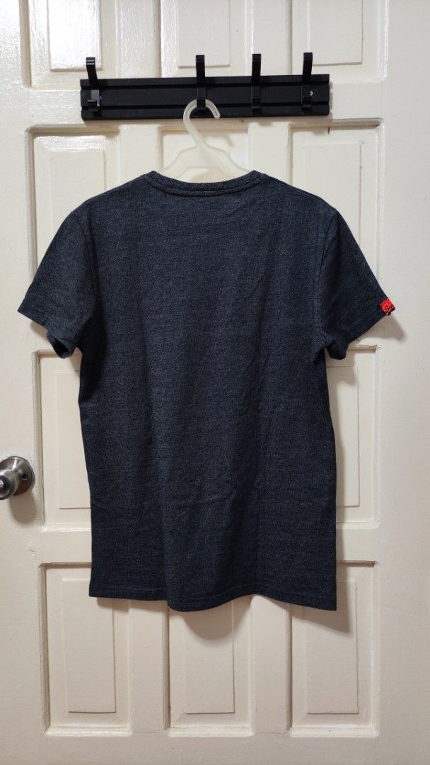 Superdry T-shirt (Category: Tshirts & Polo Shirts ) located in Paranaque City. Submitted by InsideDaBox (Listing ID 1425348002, Image 2). Description: 🚩Superdry Shirt ✅Pre-loved ✅Condition: 9/10 ✅Size: Medium ✅Color may vary due to lighting condition ✅May have crack prints ✅Location: Malasiqui, Pangasinan ✅Shipping thru J&T or LBC (Buyer's expense).