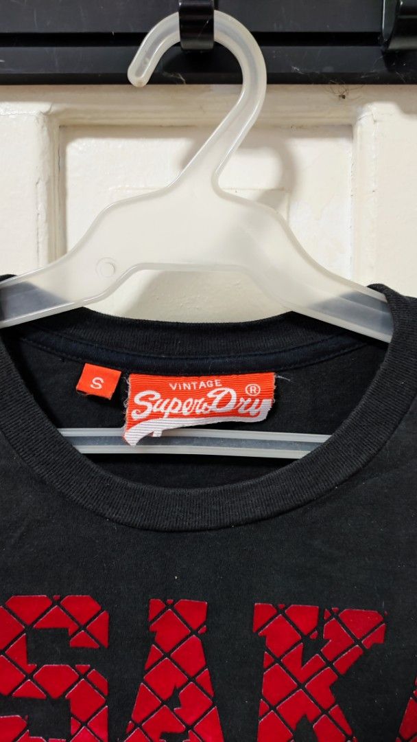Superdry T-shirt (Category: Tshirts & Polo Shirts ) located in Paranaque City. Submitted by InsideDaBox (Listing ID 1425348911, Image 3). Description: 🚩Superdry Shirt ✅Pre-loved ✅Condition: 8/10 ✅Size: Small ✅Color may vary due to lighting condition ✅May have crack prints ✅Location: Malasiqui, Pangasinan ✅Shipping thru J&T or LBC (Buyer's expense).