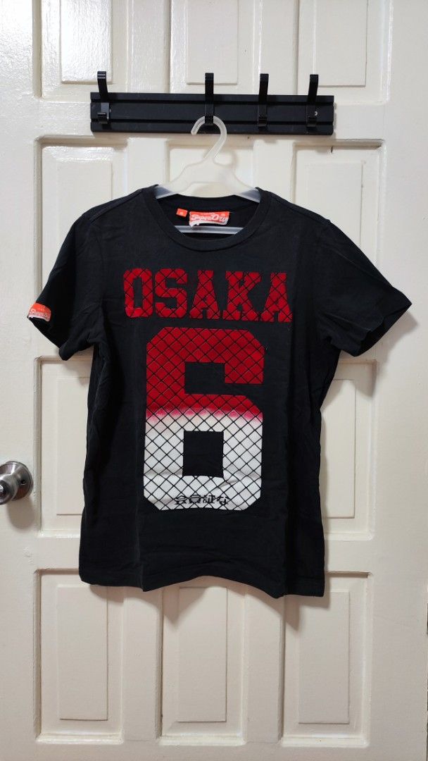 Superdry T-shirt (Category: Tshirts & Polo Shirts ) located in Paranaque City. Submitted by InsideDaBox (Listing ID 1425348911, Image 1). Description: 🚩Superdry Shirt ✅Pre-loved ✅Condition: 8/10 ✅Size: Small ✅Color may vary due to lighting condition ✅May have crack prints ✅Location: Malasiqui, Pangasinan ✅Shipping thru J&T or LBC (Buyer's expense).