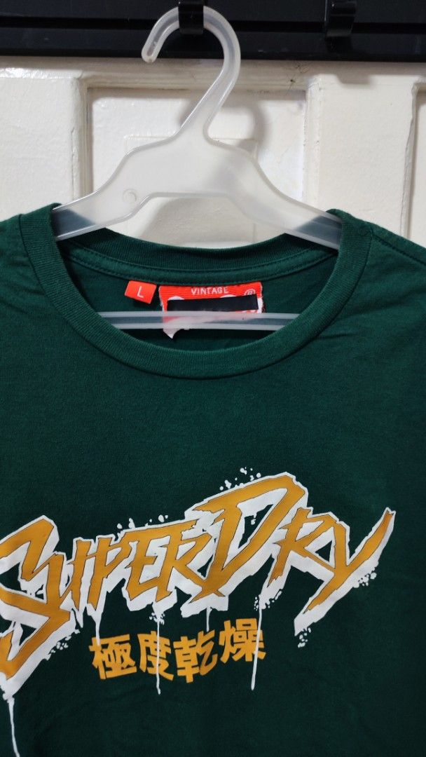 Superdry T-shirt (Category: Tshirts & Polo Shirts ) located in Paranaque City. Submitted by InsideDaBox (Listing ID 1425352164, Image 3). Description: 🚩Superdry Shirt ✅Pre-loved ✅Condition: 9/10 ✅Size: Large (but medium fit) ✅Color may vary due to lighting condition ✅May have crack prints ✅Location: Malasiqui, Pangasinan ✅Shipping thru J&T or LBC (Buyer's expense).