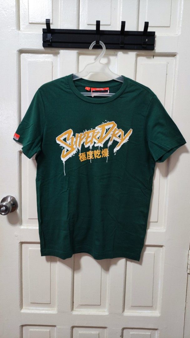 Superdry T-shirt (Category: Tshirts & Polo Shirts ) located in Paranaque City. Submitted by InsideDaBox (Listing ID 1425352164, Image 1). Description: 🚩Superdry Shirt ✅Pre-loved ✅Condition: 9/10 ✅Size: Large (but medium fit) ✅Color may vary due to lighting condition ✅May have crack prints ✅Location: Malasiqui, Pangasinan ✅Shipping thru J&T or LBC (Buyer's expense).