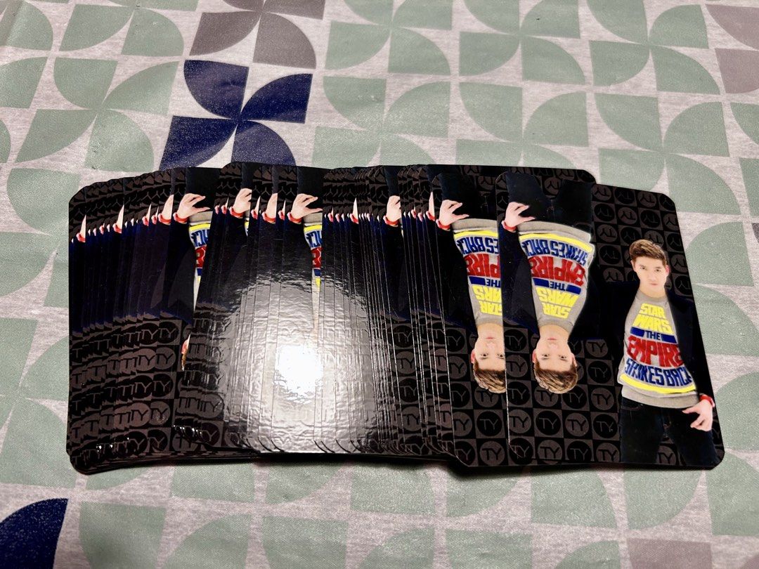 Tim Yap Playing Cards (Category: Board Games & Puzzles) located in Las Pinas. Submitted by rjmwings (Listing ID 1425372898, Image 3). Description: Complete deck of Tim Yap playing cards. Limited Edition cards from 2010. The cards feature unique designs with various celebrities and personalities such as Solenn Heussaff, Maxene Magalona, Rajo Laurel, Raymond Gutierrez and others. Includes the original box. Perfect for collectors or anyone who enjoy
