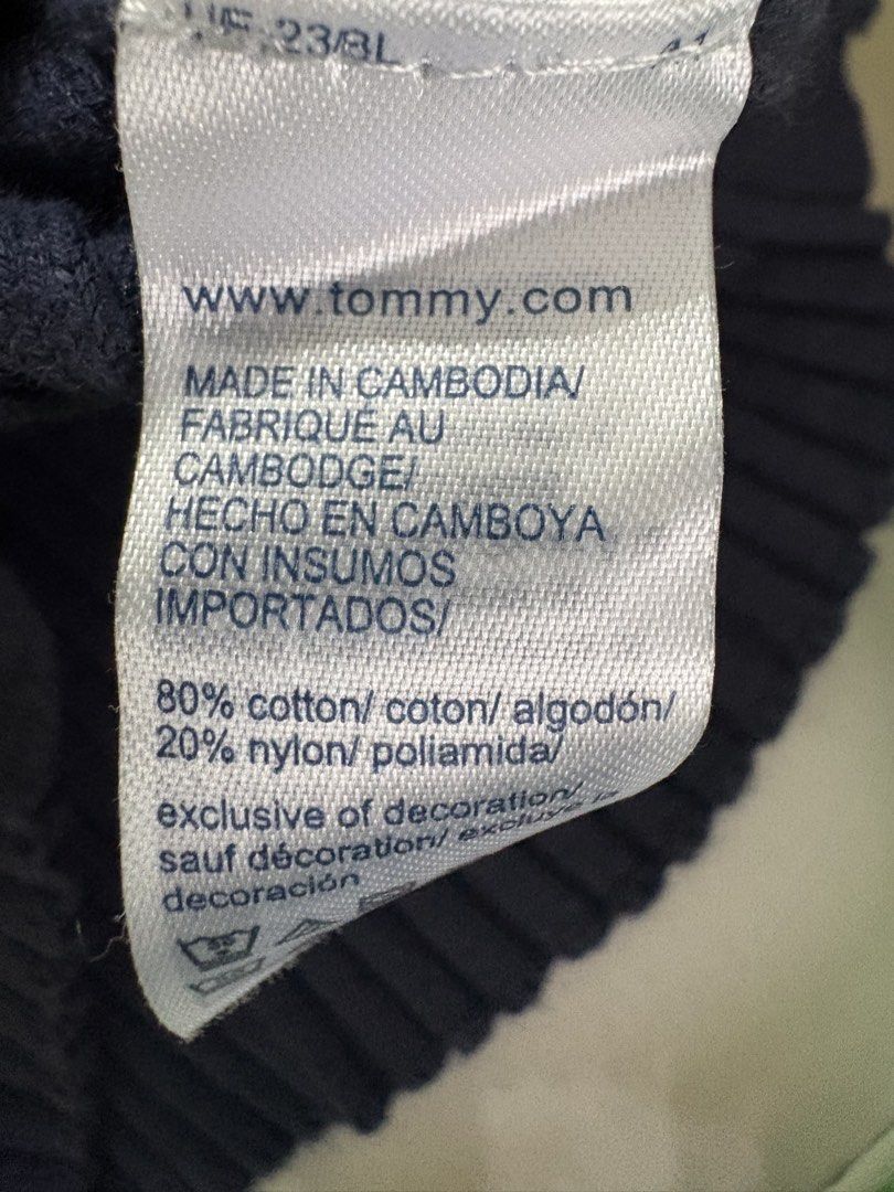 Tommy Jeans Ribbed Zip-Up Sweater (Category: Coats, Jackets and Outerwear) located in Manila. Submitted by rarity88 (Listing ID 1425341650, Image 3). Description: Like new Tommy Jeans navy blue sweater features a ribbed design and a zip-up closure. It has a small Tommy Jeans logo patch on the chest. Used only once. Fabric is stretchable. Tag says size S but best fits XS. Made from 80% cotton and 20% nylon. Please note that this needs to be washed