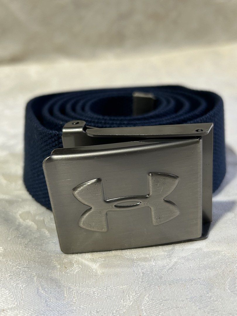 Under Armour Belt (Category: Belts) located in San Pedro. Submitted by andr39 (Listing ID 1425331977, Image 3). Description: 📍Location: San Pedro, Laguna Under Armour Men’s Golf Canvas belt Approximate measurements when laid flat: L: 49 inches W: 1.5 inches Color: Blue Buckle belt for men, canvas material ❗️Color may vary from actua item due to lighting or phone settings ❗️MoP: BDO / Gcash.