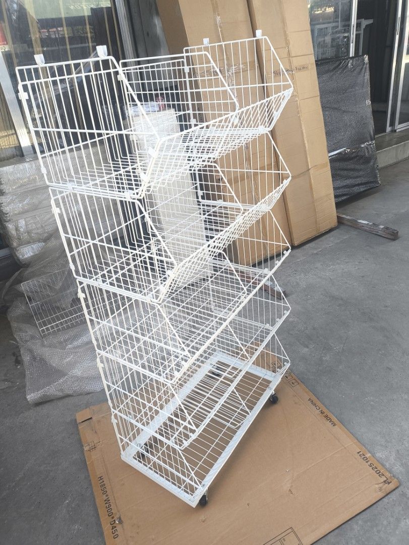 White Wire Display Rack with Wheels (Category: Shelves, Cabinets & Racks) located in Manila. Submitted by mmarie092523 (Listing ID 1425351879, Image 2). Description: material: metal color: white 5 layer with wheels .
