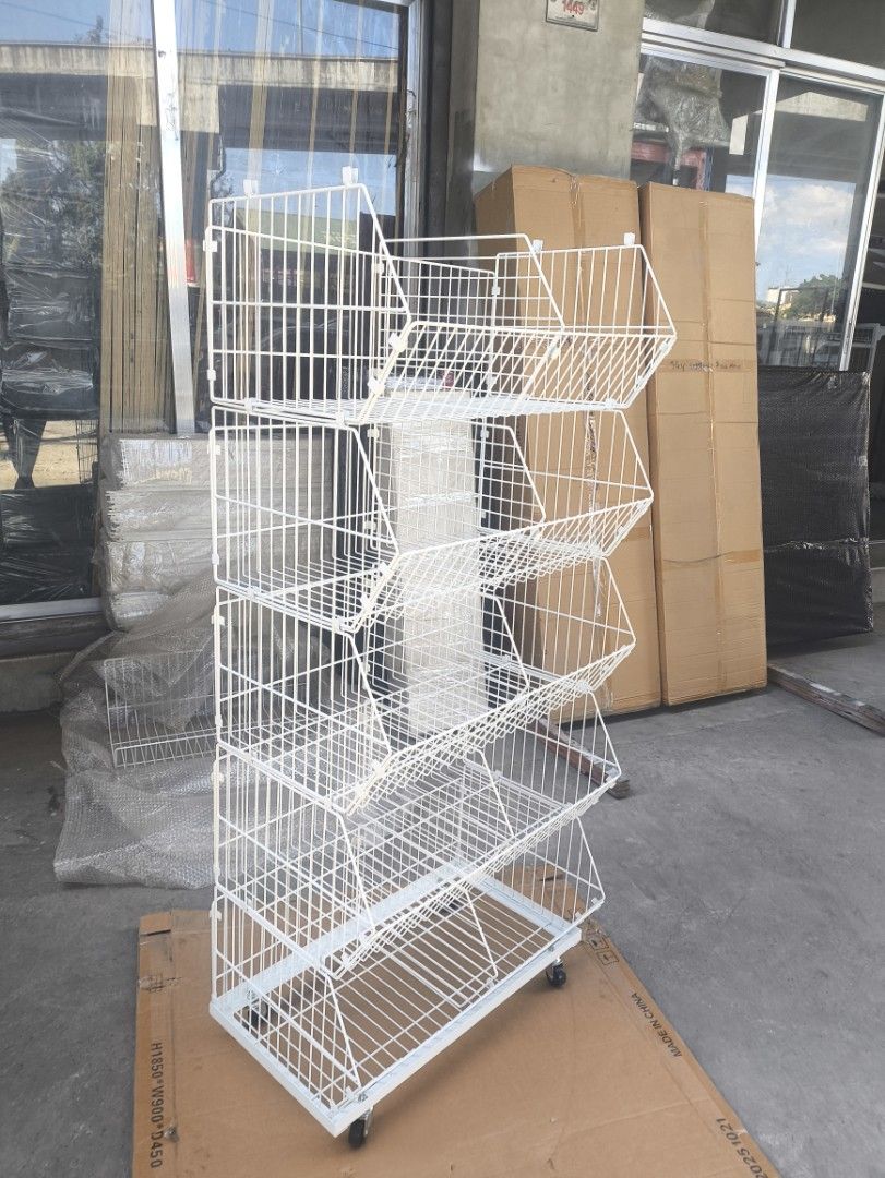White Wire Display Rack with Wheels (Category: Shelves, Cabinets & Racks) located in Manila. Submitted by mmarie092523 (Listing ID 1425351879, Image 1). Description: material: metal color: white 5 layer with wheels .