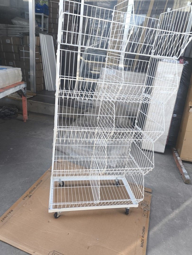 White Wire Display Rack with Wheels (Category: Shelves, Cabinets & Racks) located in Manila. Submitted by mmarie092523 (Listing ID 1425351879, Image 3). Description: material: metal color: white 5 layer with wheels .