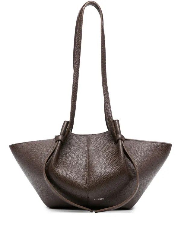 YUZEFI Small Mochi (Category: Luxury Bags & Wallets) located in Quezon City. Submitted by wasmynnowurs (Listing ID 1425389940, Image 1). Description: Bought for a trip but ended up using another bag Model photo is for reference only, item is in brown pebbled leather.
