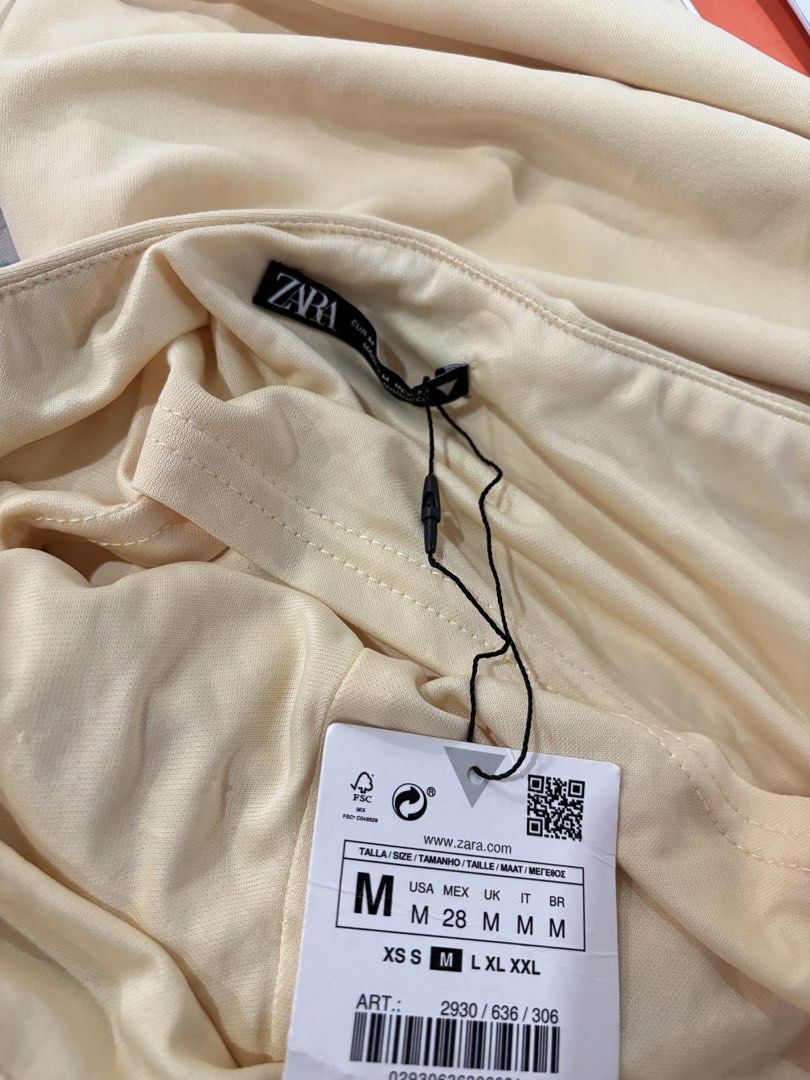Zara Strapless Midi Dress - Size M (Category: Dresses) located in Baguio. Submitted by maeov (Listing ID 1425277211, Image 3). Description: Cream yellow Best for summer OOTD RFS: too many clothes.