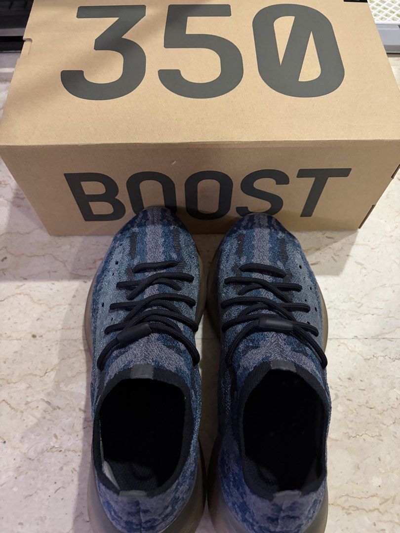 Adidas Yeezy Boost 350 V2 Blue Tint (Category: Sneakers) located in Singapore. Submitted by sk00tr (Listing ID 1425580346, Image 1). Description: Adidas Yeezy Boost 380 Covellite, superb condition, Sock-like Primeknit upper with camo/static pattern • Rounded toe shape (different from the sharper 350 V2) • Infinity/elastic laces with plastic toggle • Thick Boost midsole with translucent rubber wrapping around the sides The sole and boost in great 