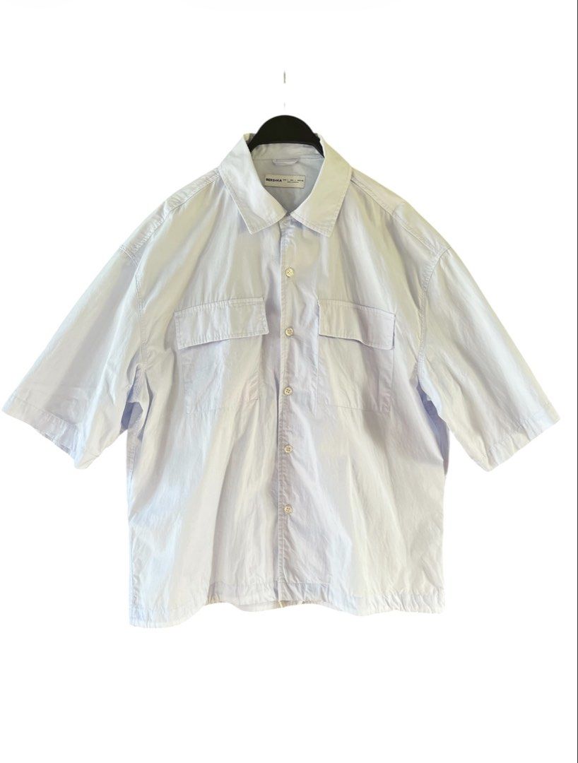 Bershka Cargo Shirt Oversized (Category: Formal Shirts) located in Cavite. Submitted by slumbermanila (Listing ID 1425552520, Image 2). Description: this color is Powder blue may vary due to lighting conditions Bershka Cargo Shirt Oversized in cotton material in good condition with drawstring in hemline .