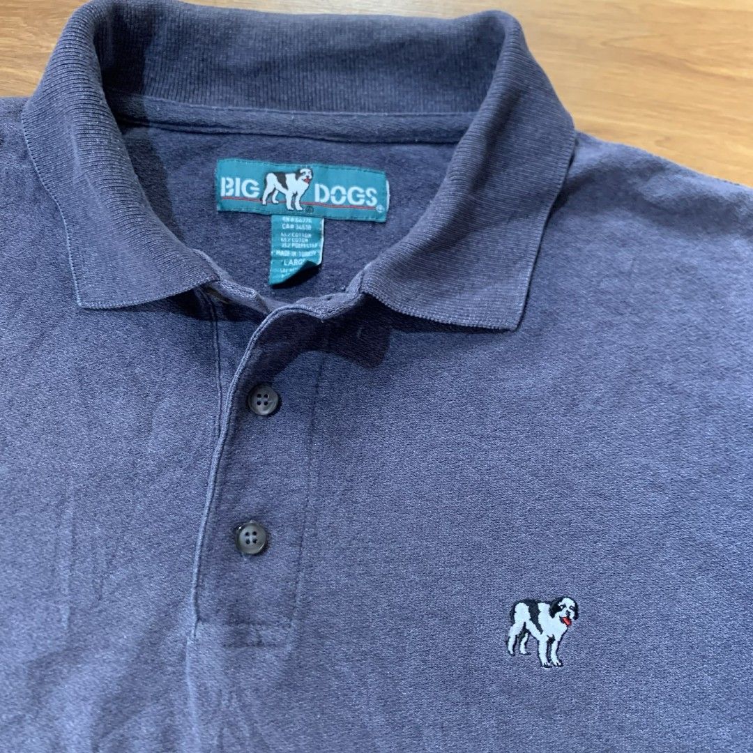 Big Dogs Polo Shirt - Large (Category: Tshirts & Polo Shirts ) located in Calauan. Submitted by randomthrift.ph (Listing ID 1425475008, Image 2). Description: Big Dogs polo shirt is a classic addition to any wardrobe. It features a navy blue color and a collared neckline. The shirt is made of a blend of cotton and polyester. It has a small embroidered logo on the chest. The shirt is a size large..