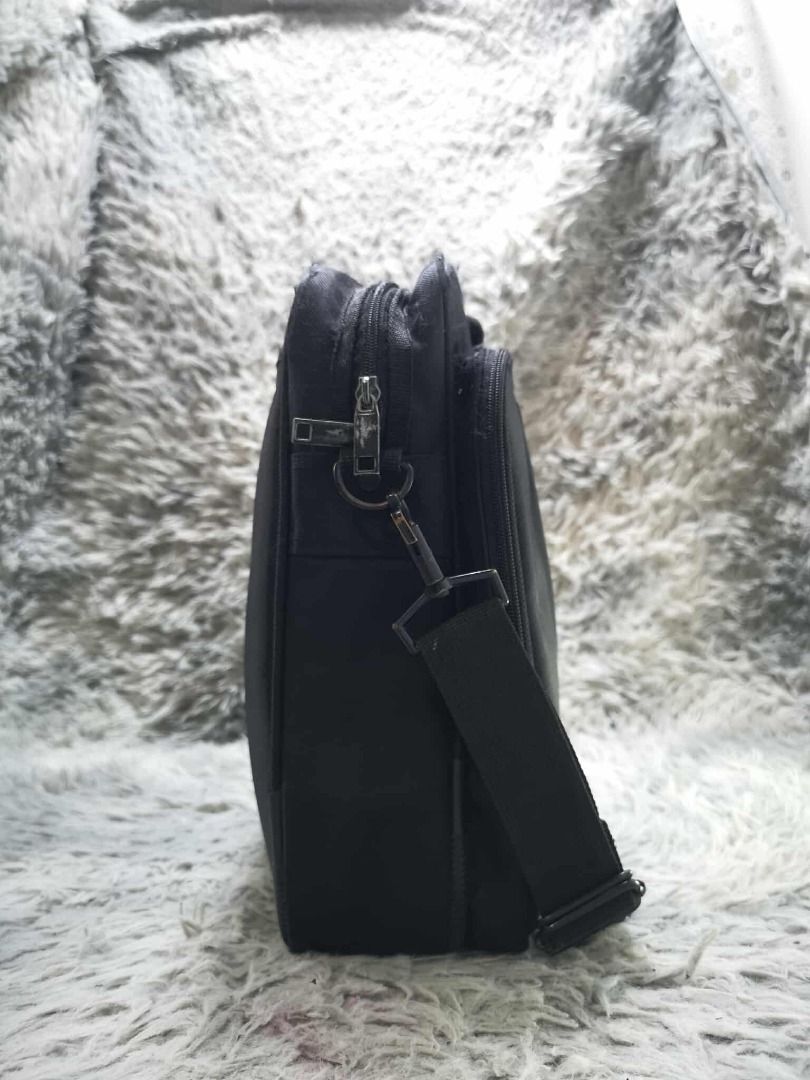 Black Laptop Bag With Detachable Strap (Category: Laptop Bags & Sleeves) located in Santa Cruz. Submitted by jmy_surplus.2 (Listing ID 1425477293, Image 3). Description: Size ; L - 13 W - 17 Color ; Black Type ; Laptop bag Brand ; No Brand Material ; Nylon Style ; Black Laptop bag LR 142 JMY 5 Batch #192.