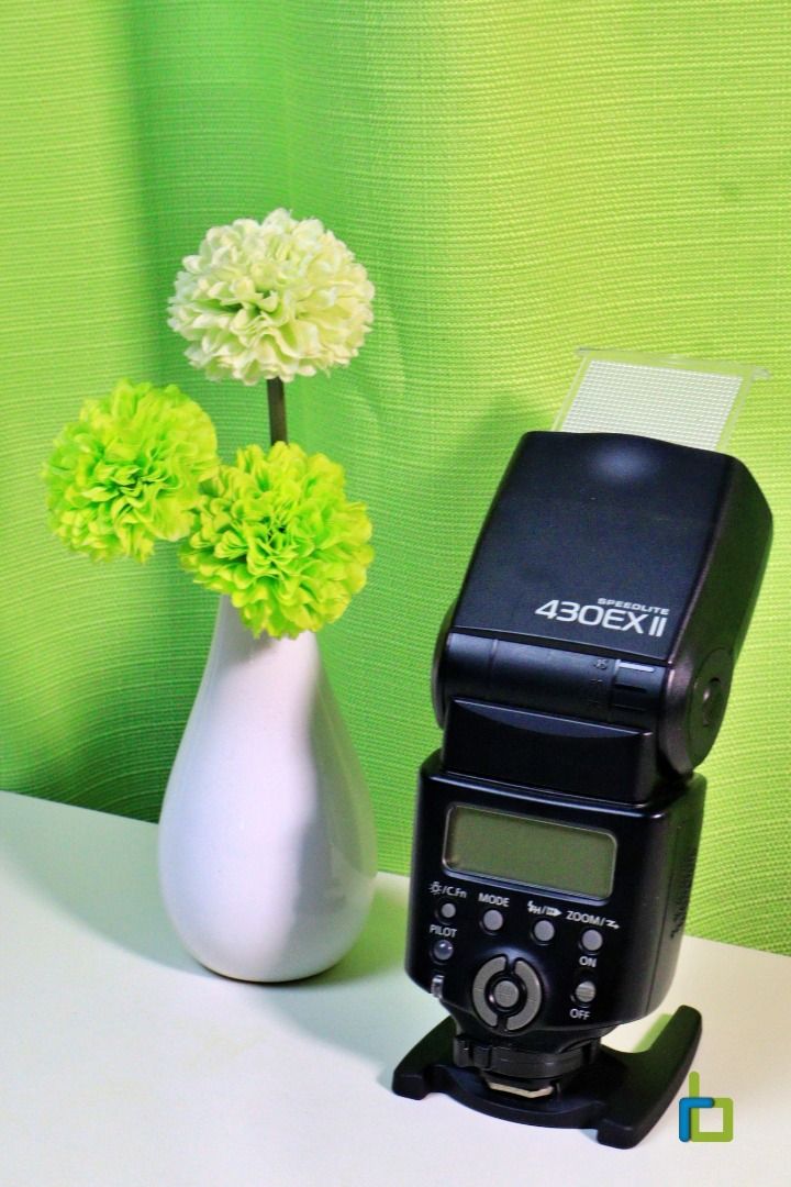 Canon Speedlite 430EX II Flash (Category: Flashes) located in Quezon City. Submitted by r4yb4n315 (Listing ID 1425470353, Image 3). Description: Canon Speedlite 430 EX II Flash Overview: The Canon Speedlite 430EX II is a compact, versatile E-TTL II compatible flash with a guide number of 43m (141 ft.) at ISO 100/105mm. Ideal for on-camera or off-camera wireless slave use, it features a 24-105mm auto-zoom head (14mm with panel), fast/silent recycl