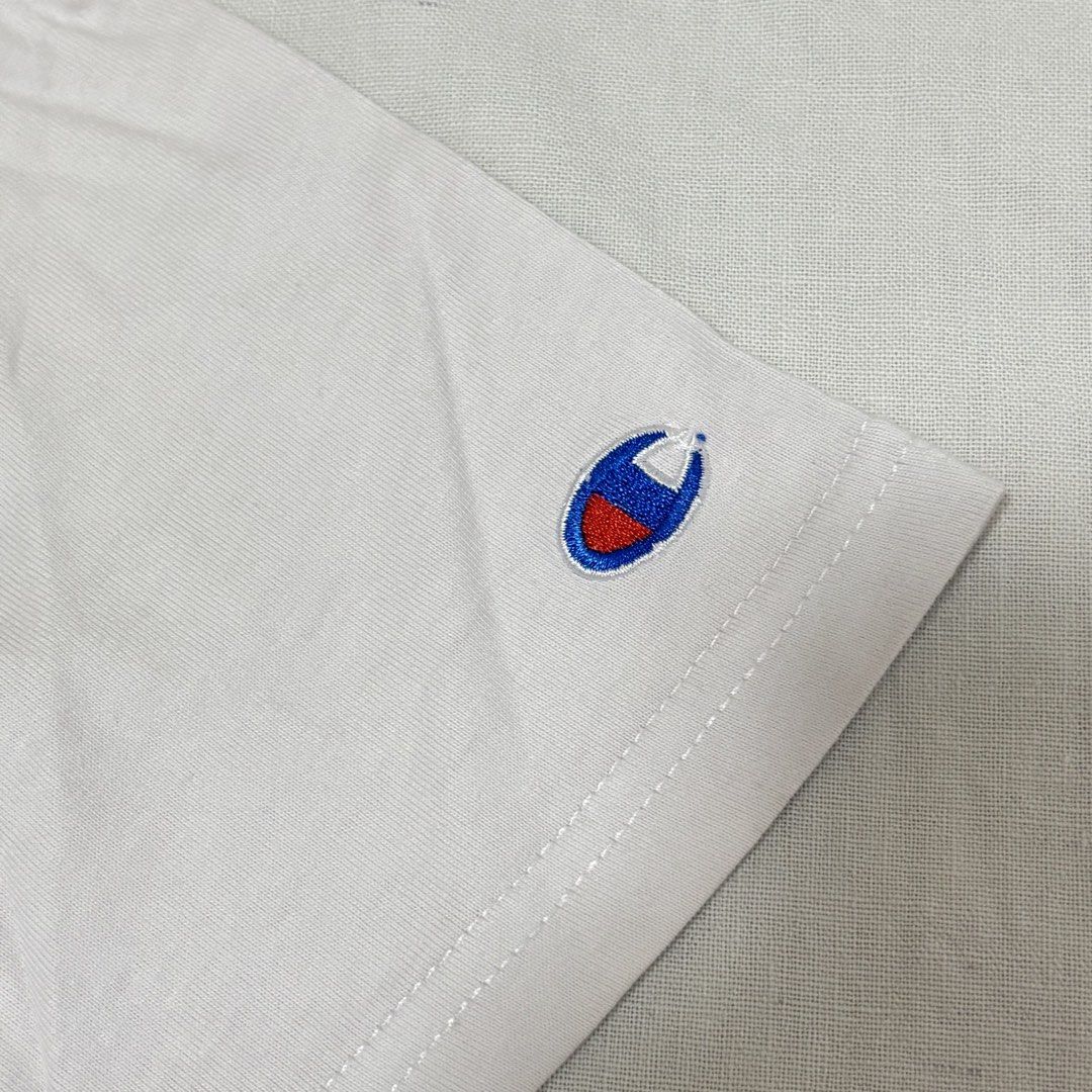 Champion White T-shirt Medium (Category: Shirts) located in Cabuyao City. Submitted by nesse21 (Listing ID 1425546863, Image 3). Description: Champion Tshirt Size: Medium Issue: Yellow Stains and Ink Rfs: Decluttering .