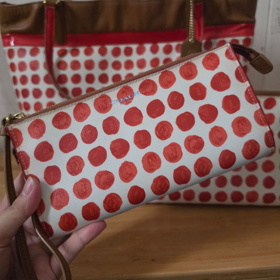 Coach Polka Dot Handbag Set (Category: Luxury Bags & Wallets) located in Subic. Submitted by lucky_jayden_authenticitems (Listing ID 1425491011, Image 2). Description: Coach handbag set features a tote bag, a wristlet, and a small pouch, all with a white and red polka dot pattern. The tote bag has brown leather handles and trim, a red interior, and a Coach hang tag. The wristlet and pouch have a matching design. The tote bag has a zip closure and