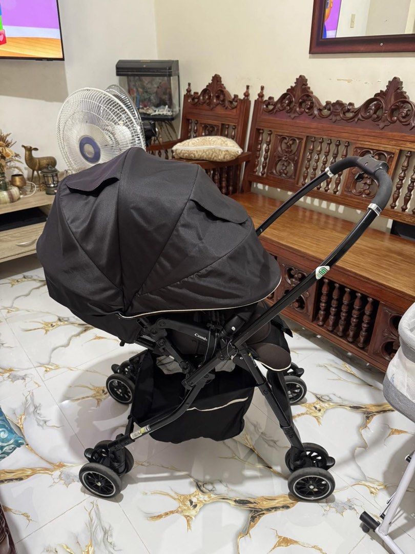 Combi Stroller (Category: Strollers) located in Las Pinas. Submitted by applesthread (Listing ID 1425536555, Image 3). Description: Newborn to toddler Lightweight Reversible handle Excellent condition! Ang ganda ng kulaaay 🫶 Rfs: maliit na kay baby.