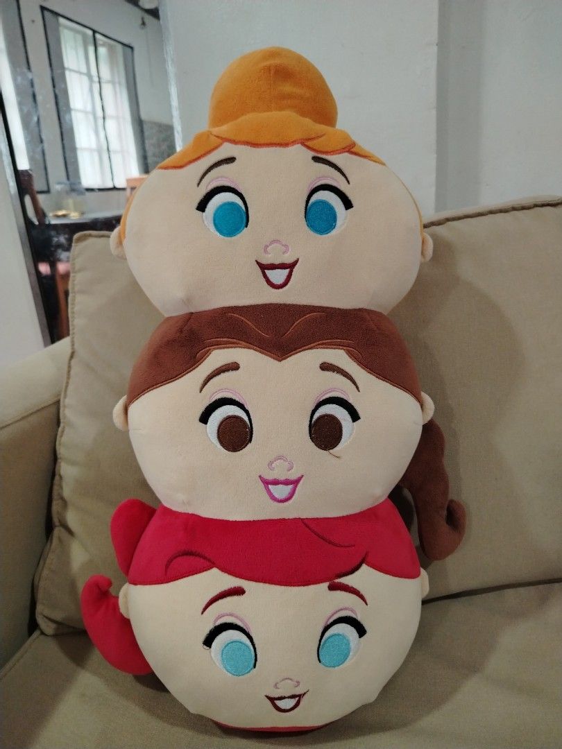 Disney Princess Stacked Plush Toy (Category: Plushies & Soft Toys) located in Rizal. Submitted by zhellieme (Listing ID 1425452817, Image 1). Description: Adorable plush toy features three Disney princesses stacked together. The top princess has orange hair, the middle one has brown hair, and the bottom one has red hair. It is a soft and cuddly toy, perfect for Disney fans of all ages. The plush is designed with detailed facial features and vibra
