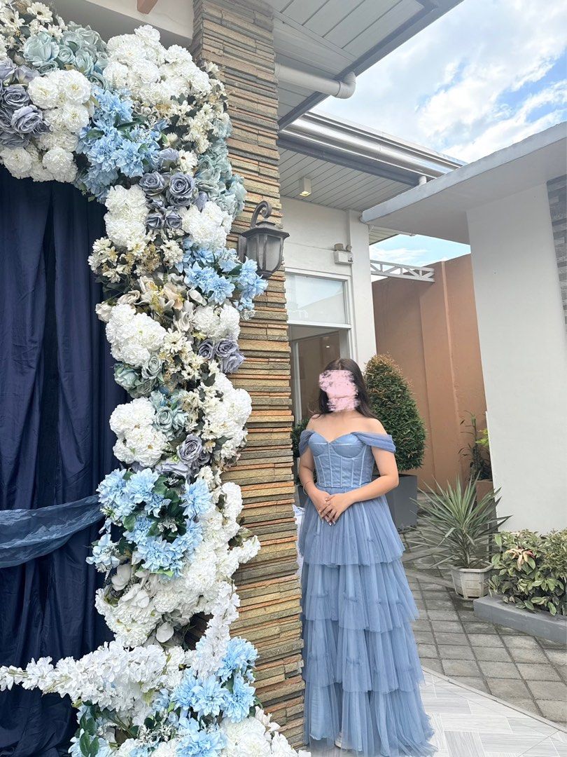 Dusty Blue Off-Shoulder Gown (Category: Evening dresses & gowns) located in Obando. Submitted by playdressup.ph (Listing ID 1425493157, Image 1). Description: - The gown has an adjustable back with a crisscross tie design. (no need to do alterations na since adjustable siya) ❤️ height: 5’2 weight: 55kg waist size: 29 CORSET TYPE OF GOWN (i only worn it once sa wedding) DUSTY BLUE GOWN BRIDESMAID GOWN .