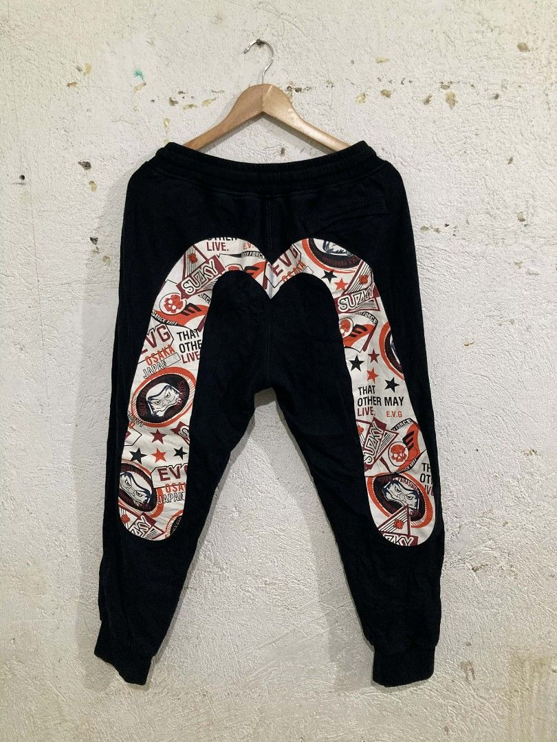 EVISU Black Sweatpants (Off, Random Tag) (Category: Joggers) located in San Jose del Monte. Submitted by zen31 (Listing ID 1425524517, Image 1). Description: EVISU DAICOCK JOGGER PANTS (OFF, RANDOM TAG ONLY) 30-34 WAIST OPEN W/LACE, 35 LENGTH, 11 THIGH & 5 HEM VERY GOOD CONDITION 9/10 COLOR RATE NO ISSUE, NEED WASH ONLY.