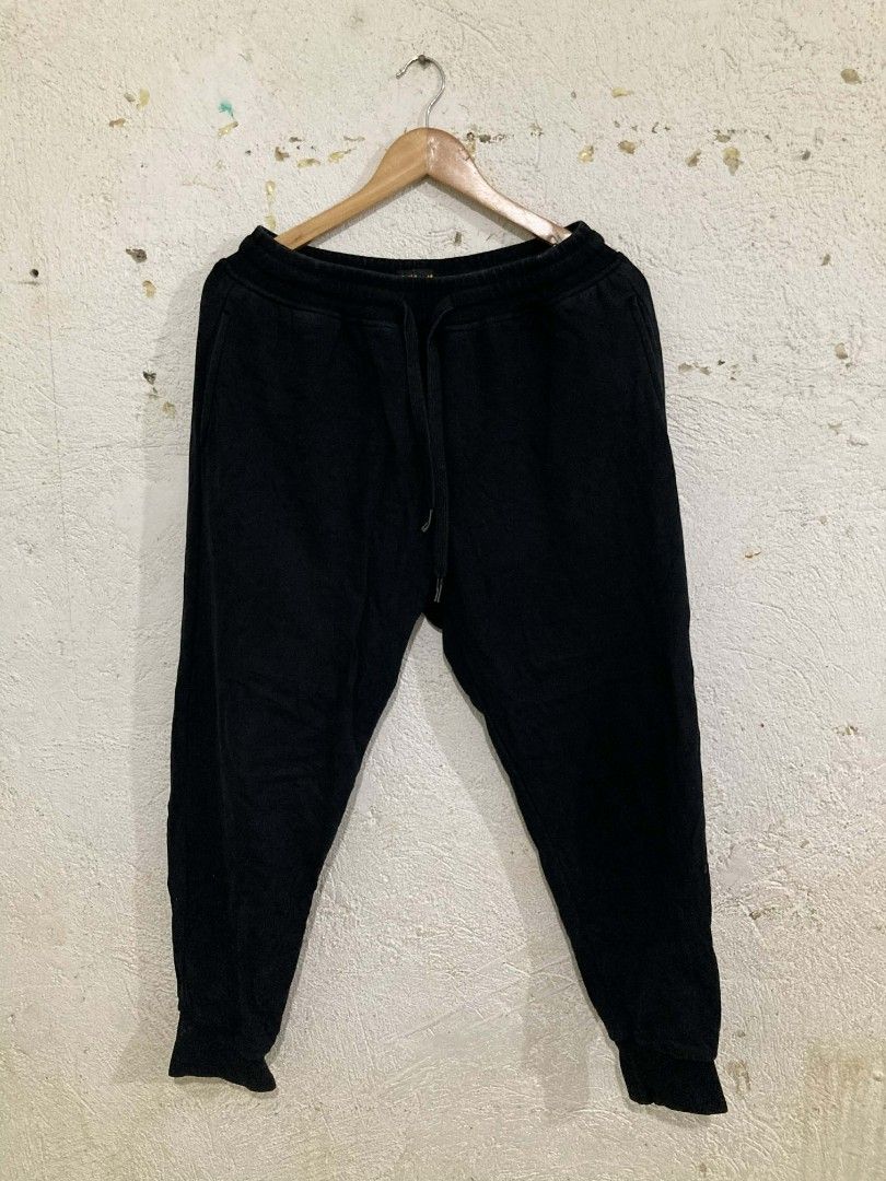 EVISU Black Sweatpants (Off, Random Tag) (Category: Joggers) located in San Jose del Monte. Submitted by zen31 (Listing ID 1425524517, Image 2). Description: EVISU DAICOCK JOGGER PANTS (OFF, RANDOM TAG ONLY) 30-34 WAIST OPEN W/LACE, 35 LENGTH, 11 THIGH & 5 HEM VERY GOOD CONDITION 9/10 COLOR RATE NO ISSUE, NEED WASH ONLY.