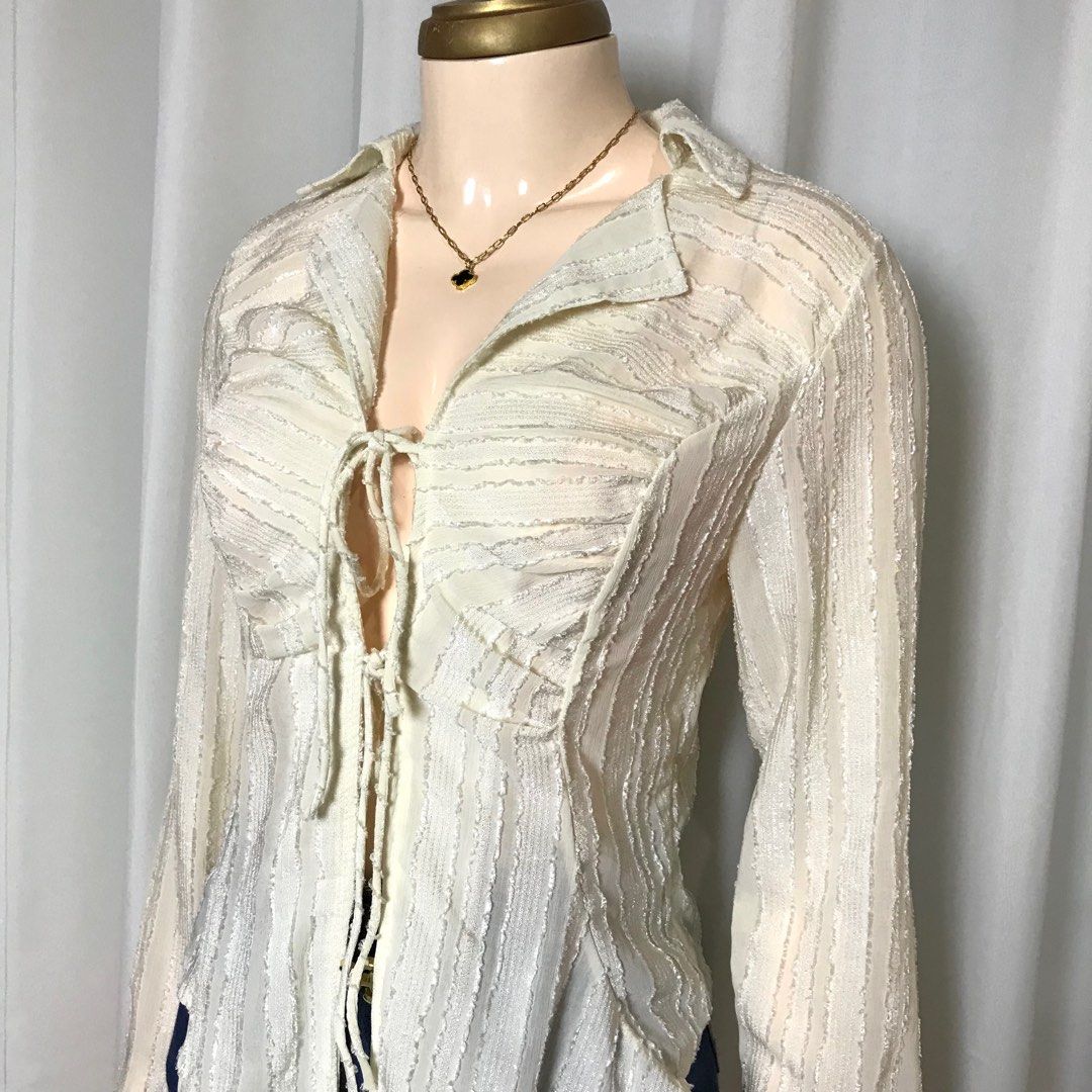 Fairy core Lace up Tie-Front Blouse (Category: Blouses) located in Pagadian. Submitted by picknpack (Listing ID 1425486611, Image 2). Description: •freeszie (self tie) •semi mesh, no issue •magandaaa sa personall🥹💯 •color: cream white.
