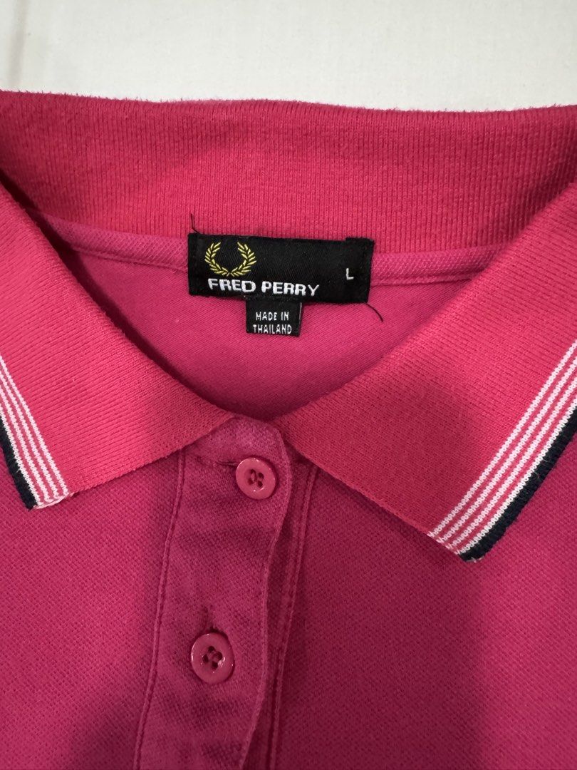 Fred Perry Polo Shirt for Boys (Category: Babies & Kids Fashion) located in Batangas. Submitted by GDW98 (Listing ID 1425543430, Image 3). Description: Brand: Fred Perry Condition: Gently used, no flaws Color: fuschia pink Size: 8-12 yrs old RFS: outgrown MOP: bank transfer, gcash SF: c/o buyer M-F except holidays.