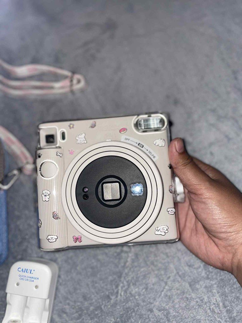 Fujifilm Instax Square SQ1 Camera with Accessories (Category: Cameras) located in Tacloban City. Submitted by _lovesecondhand_ (Listing ID 1425450645, Image 3). Description: .