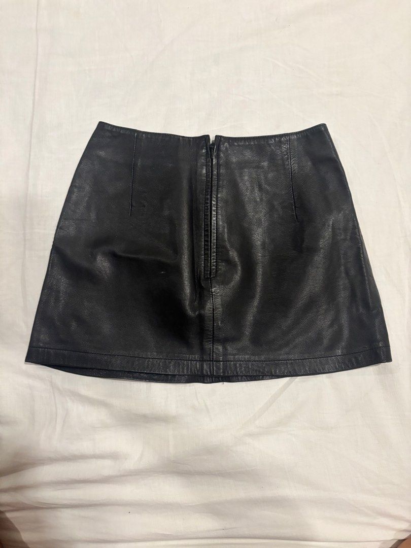 Genuine Leather Mini Skirt - Size S (Category: Skirts) located in Manila. Submitted by kianahenar84422 (Listing ID 1425570653, Image 2). Description: - genuine leather mini skirt - great quality - would be obsessed with this if I didn’t have an ass - XS (size 24) waistline - no scuffs or scratches - slight opening in the seam but not obvious and easily sewn back together - double lined - negotiable.