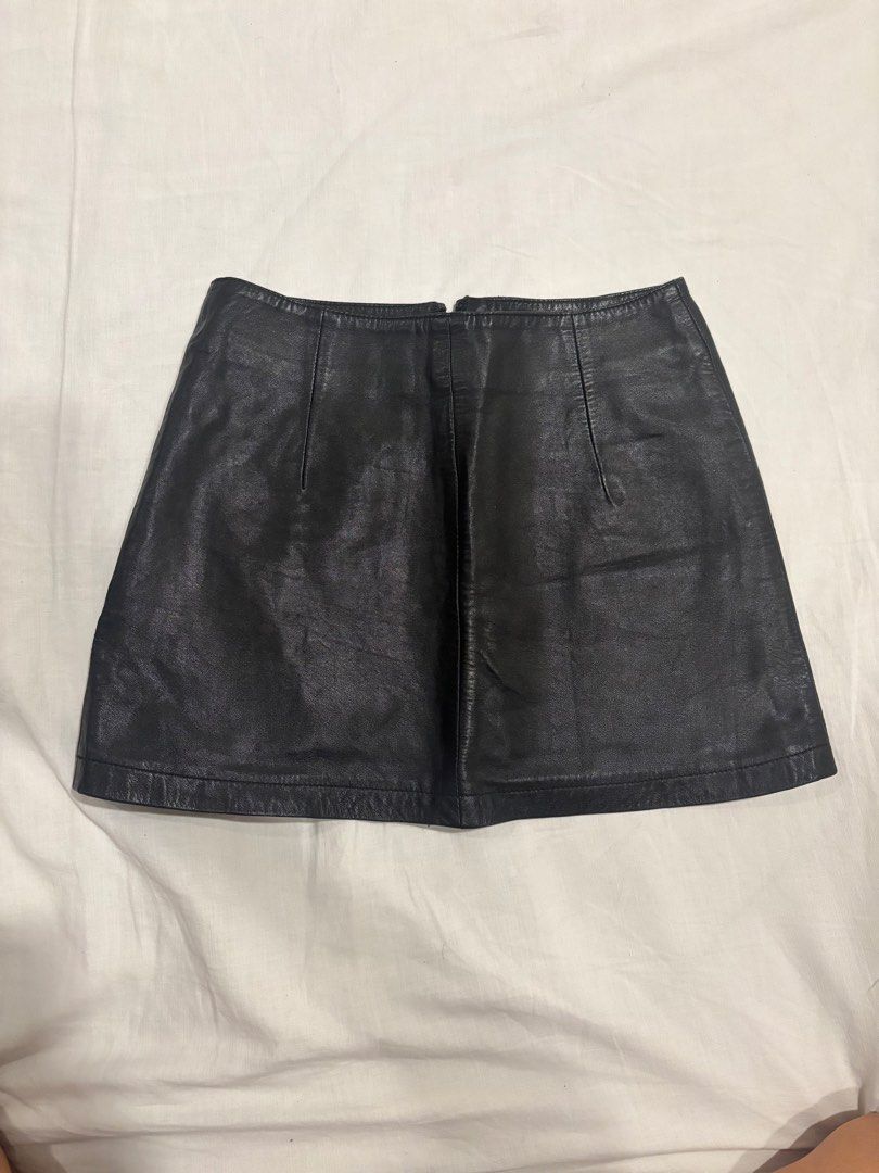 Genuine Leather Mini Skirt - Size S (Category: Skirts) located in Manila. Submitted by kianahenar84422 (Listing ID 1425570653, Image 1). Description: - genuine leather mini skirt - great quality - would be obsessed with this if I didn’t have an ass - XS (size 24) waistline - no scuffs or scratches - slight opening in the seam but not obvious and easily sewn back together - double lined - negotiable.